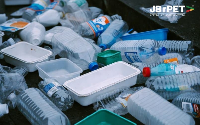 Discarded plastic bottles collected for recycling and sustainable waste management by JB rPET