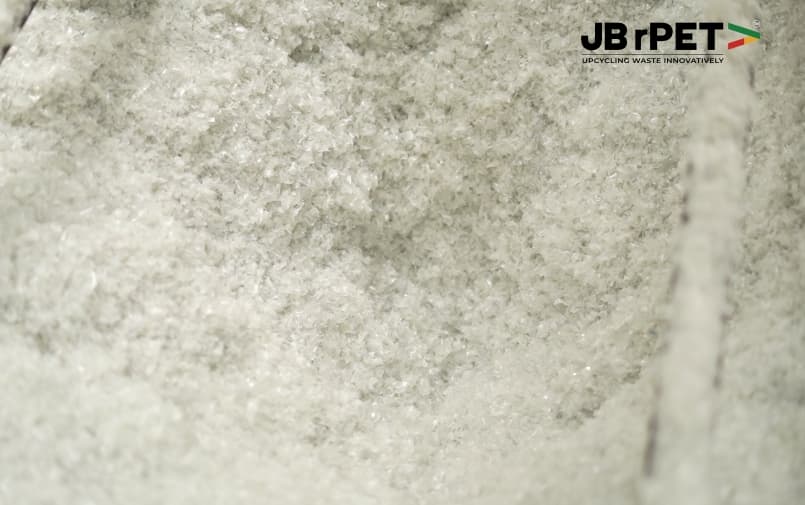 Close-up of translucent PET flakes showing their texture