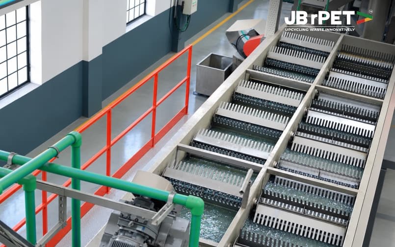 Industrial washing equipment with water channels at a PET recycling facility